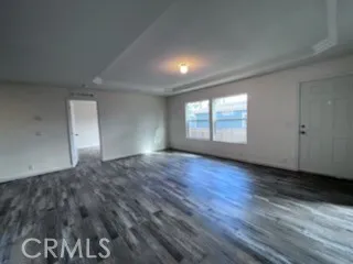 a kitchen with stainless steel appliances granite countertop a sink a stove a refrigerator and microwave