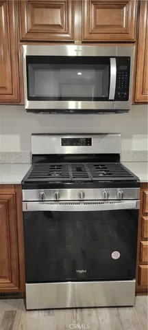 a view of a house with a street