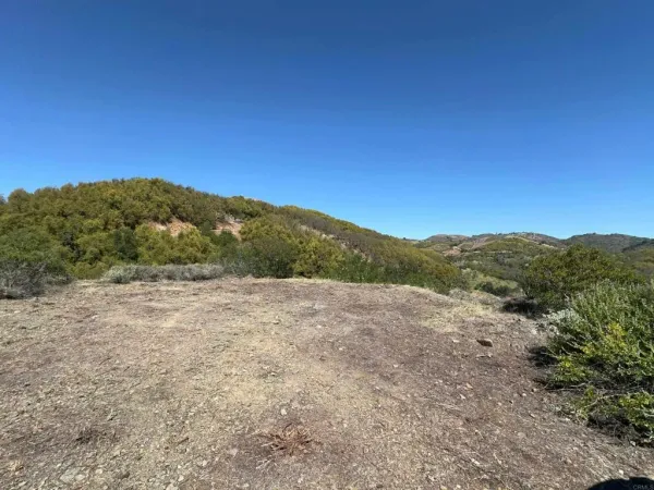 a view of an outdoor space with mountain view