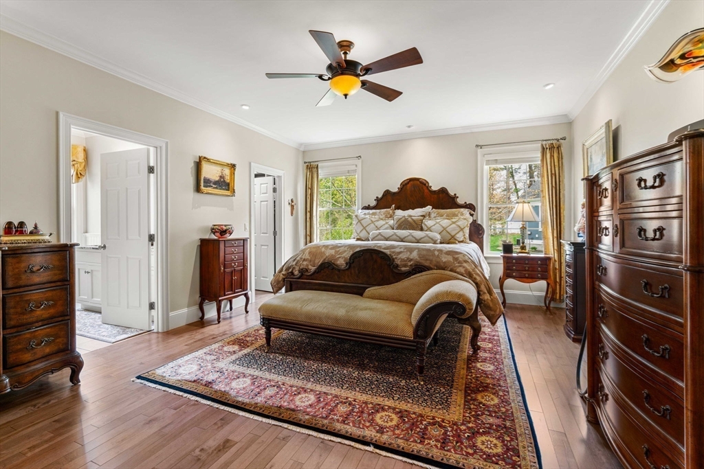 4 Point Shore Overlook Amesbury, MA 01913 - Photo 17 of 42 a living room with furniture ceiling fan and a rug