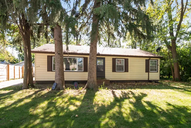 a front view of house with yard