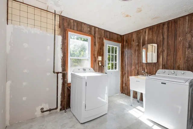 a utility room with dryer and washer