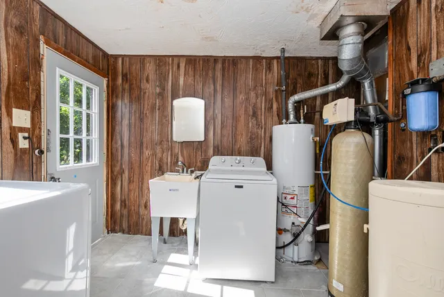 a utility room with dryer and washer