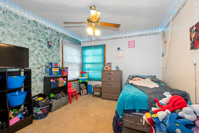 a room with toys and a tv