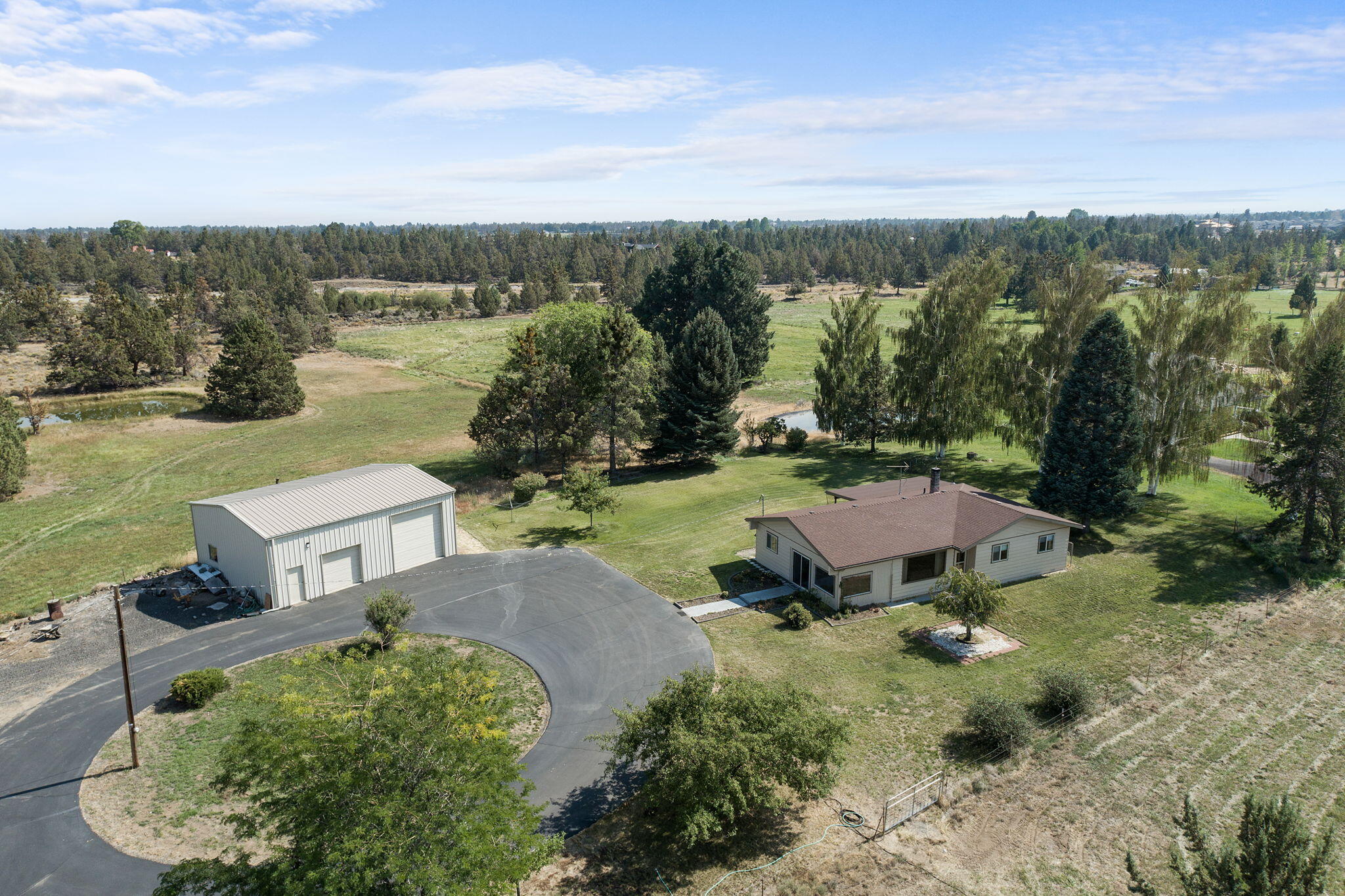 63360 Deschutes Market Road Bend, OR 97701 - Photo 1 of 39 Front of home and Shop