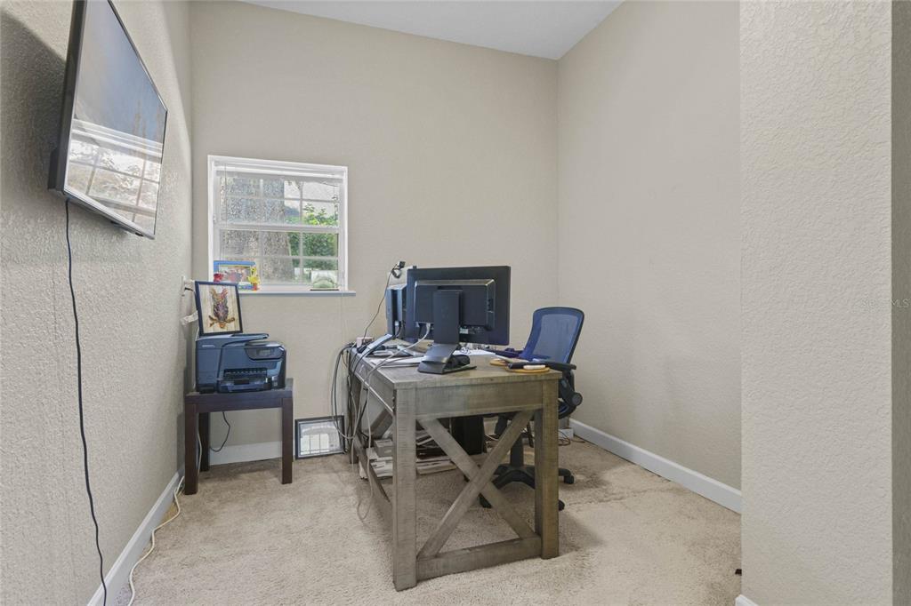 715 Magnolia Street Windermere, FL 34786 - Photo 28 of 44 a view of a workspace with furniture