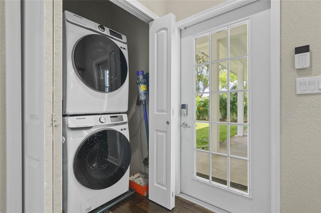 715 Magnolia Street Windermere, FL 34786 - Photo 29 of 44 a view of a hallway with washer and dryer