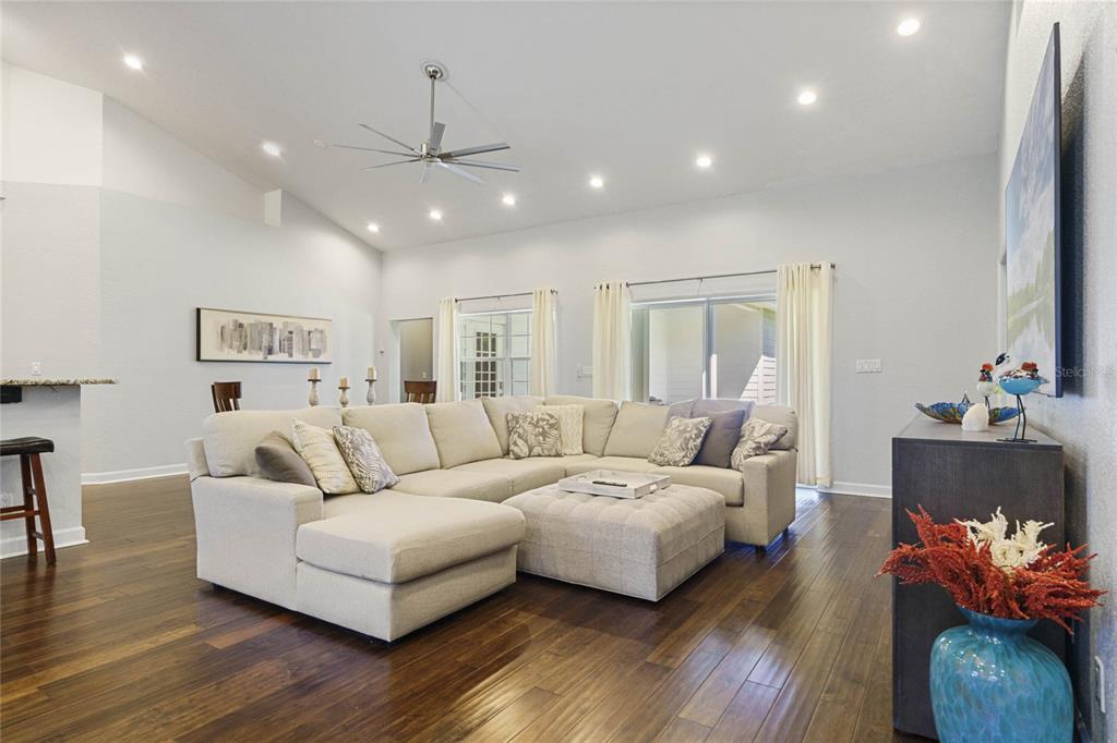 715 Magnolia Street Windermere, FL 34786 - Photo 9 of 44 a living room with furniture and wooden floor