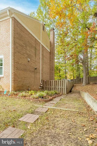 a view of a backyard of the house