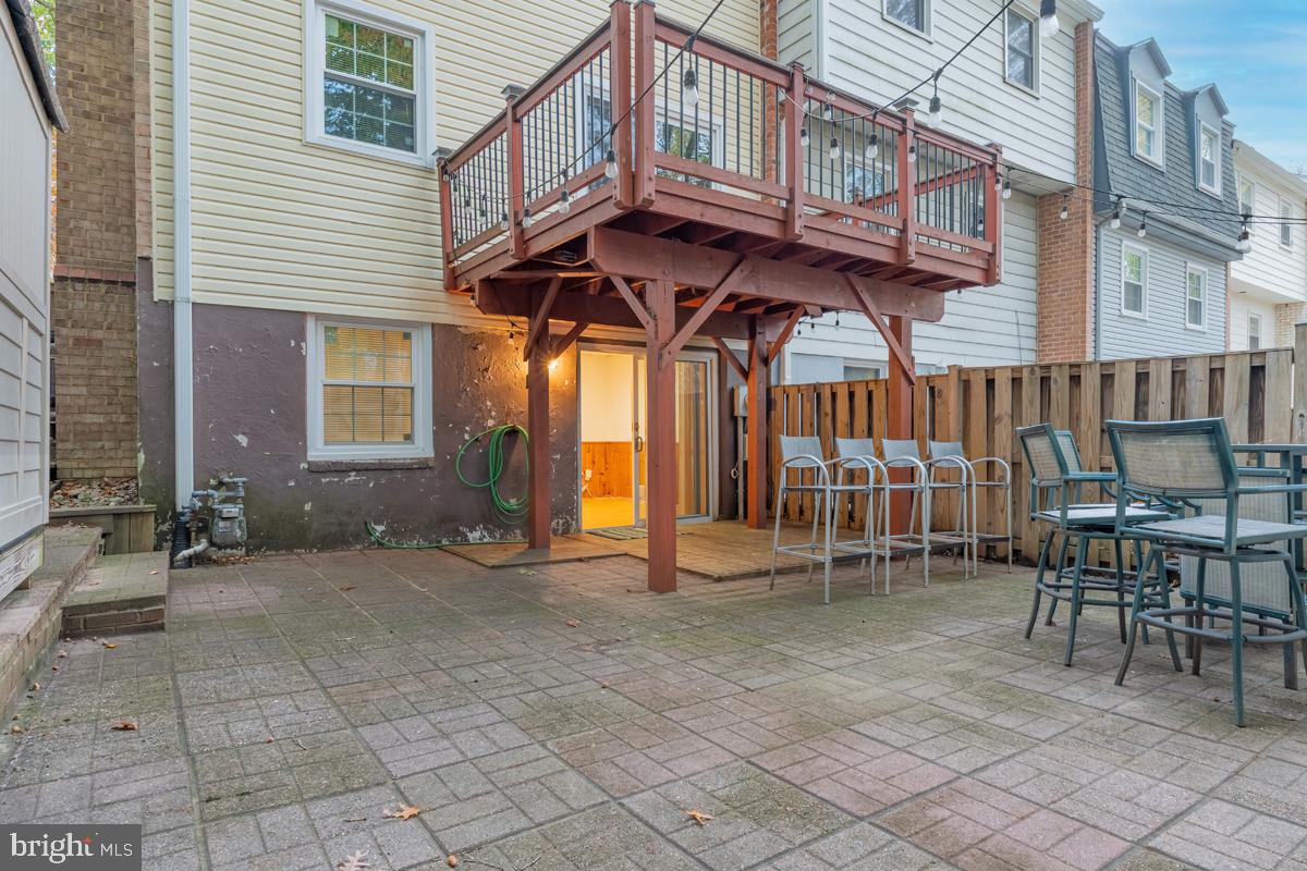 9256 Sprucewood Road Burke, VA 22015 - Photo 3 of 13 a view of a building with sitting area