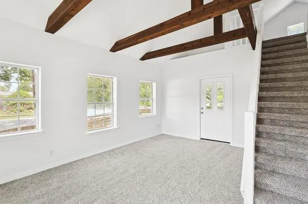 an empty room with windows