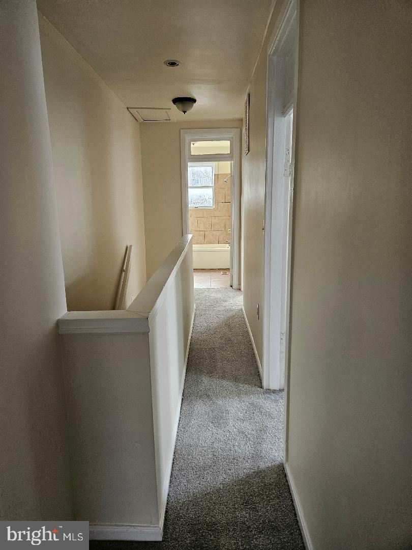 1635 U Street Southeast Washington, DC 20020 - Photo 22 of 33 Bright and inviting hallway with natural light.
