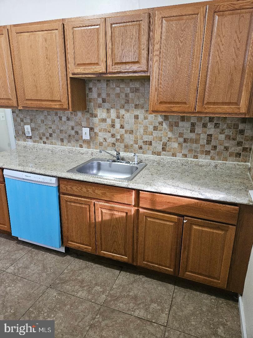 1635 U Street Southeast Washington, DC 20020 - Photo 24 of 33 Charming kitchen with modern finishes.