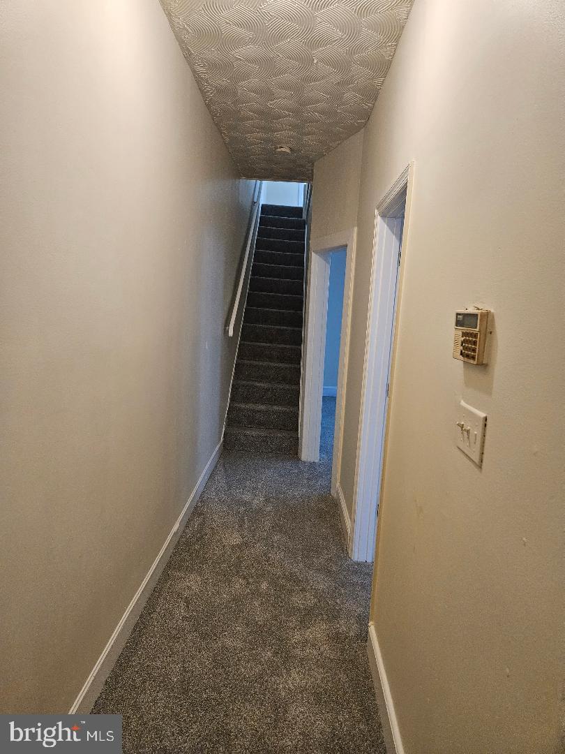 1635 U Street Southeast Washington, DC 20020 - Photo 28 of 33 Inviting hallway leading to upper levels.