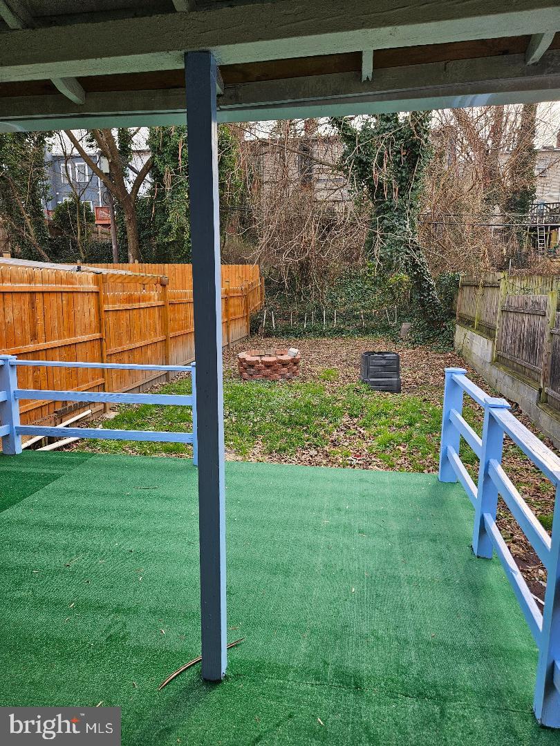 1635 U Street Southeast Washington, DC 20020 - Photo 32 of 33 Serene backyard retreat with lush greenery.