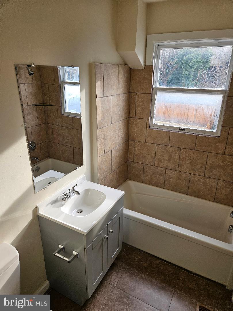 1635 U Street Southeast Washington, DC 20020 - Photo 7 of 33 Bright and inviting bathroom oasis.