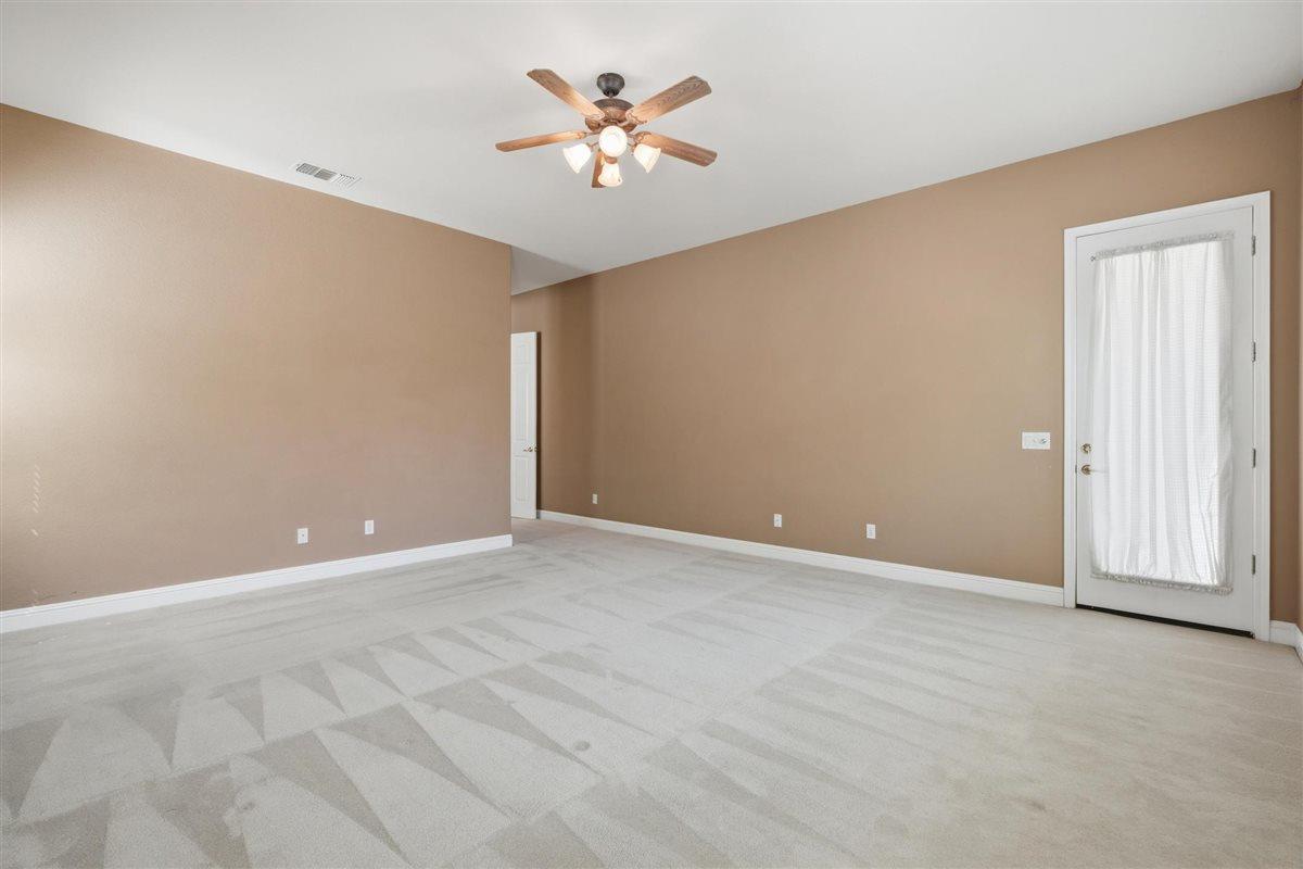 4129 Poppleton Way Carmichael, CA 95608 - Photo 30 of 48 a view of an empty room with chandelier fan