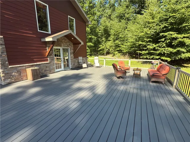 a view of a chairs on the roof deck