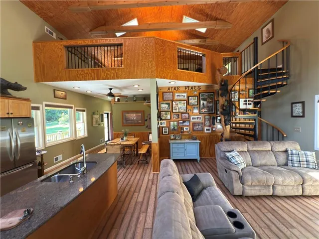 a kitchen with a sink a counter and appliances