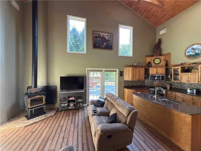 a view of a swimming pool with an outdoor seating