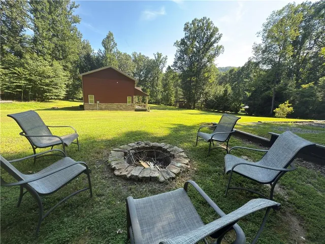 a view of a swimming pool with a lounge chairs