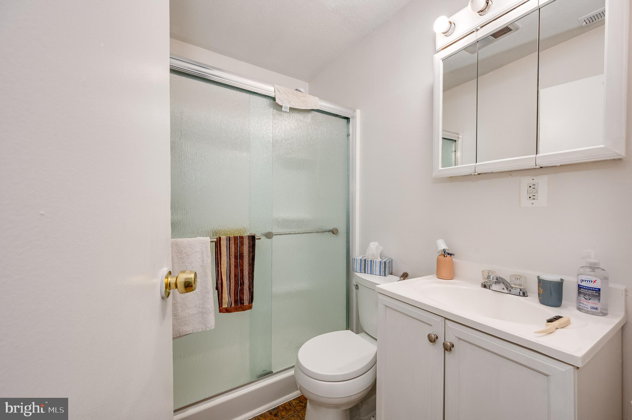 12 Orchard Drive Ranson, WV 25438 - Photo 16 of 38 Hall bath w/ 5 ft acrylic tub/shower w/ glass door
