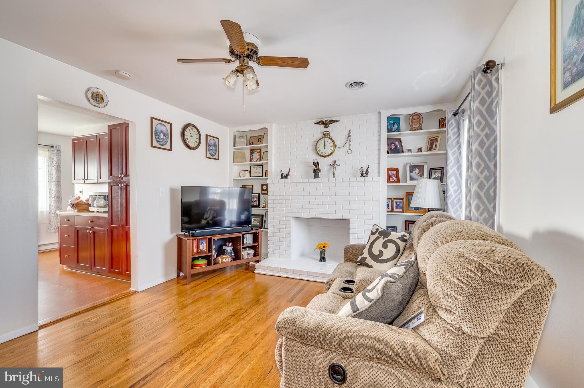 12 Orchard Drive Ranson, WV 25438 - Photo 5 of 38 Features stunning hardwood floors and brick