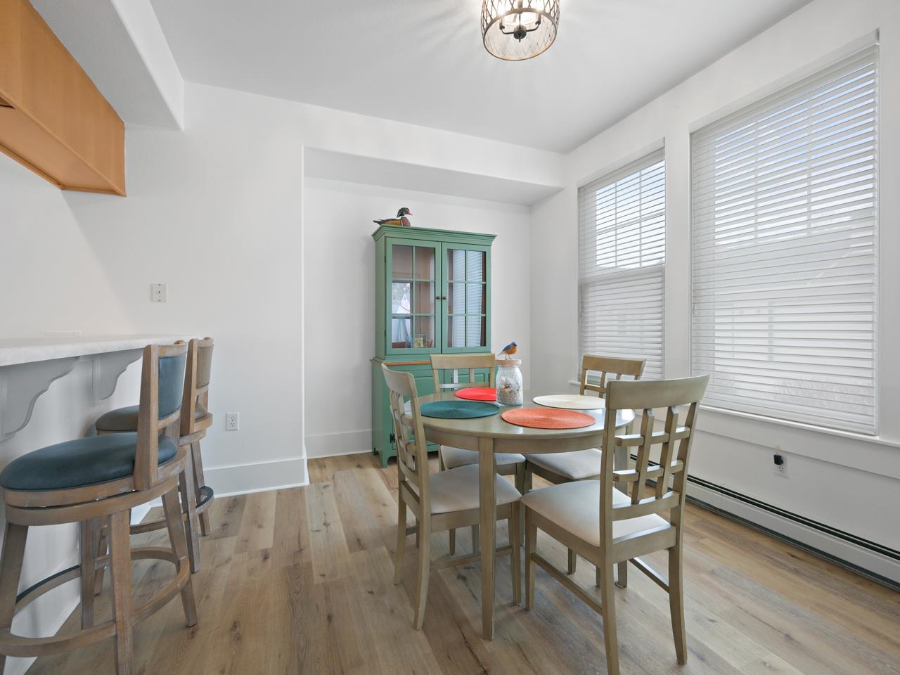 1117 Buttercup Lane Fruita, CO 81521 - Photo 9 of 25 a view of a dining room with furniture and wooden floor