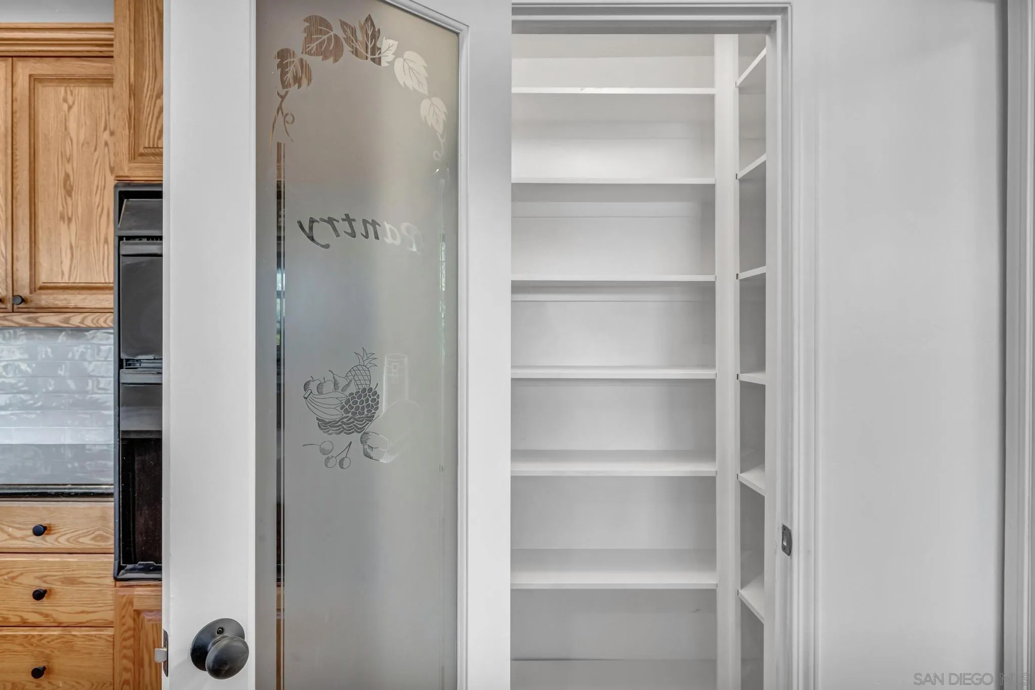 1230 Arnold Way Alpine, CA 91901 - Photo 16 of 60 a view of walk in closet with empty racks