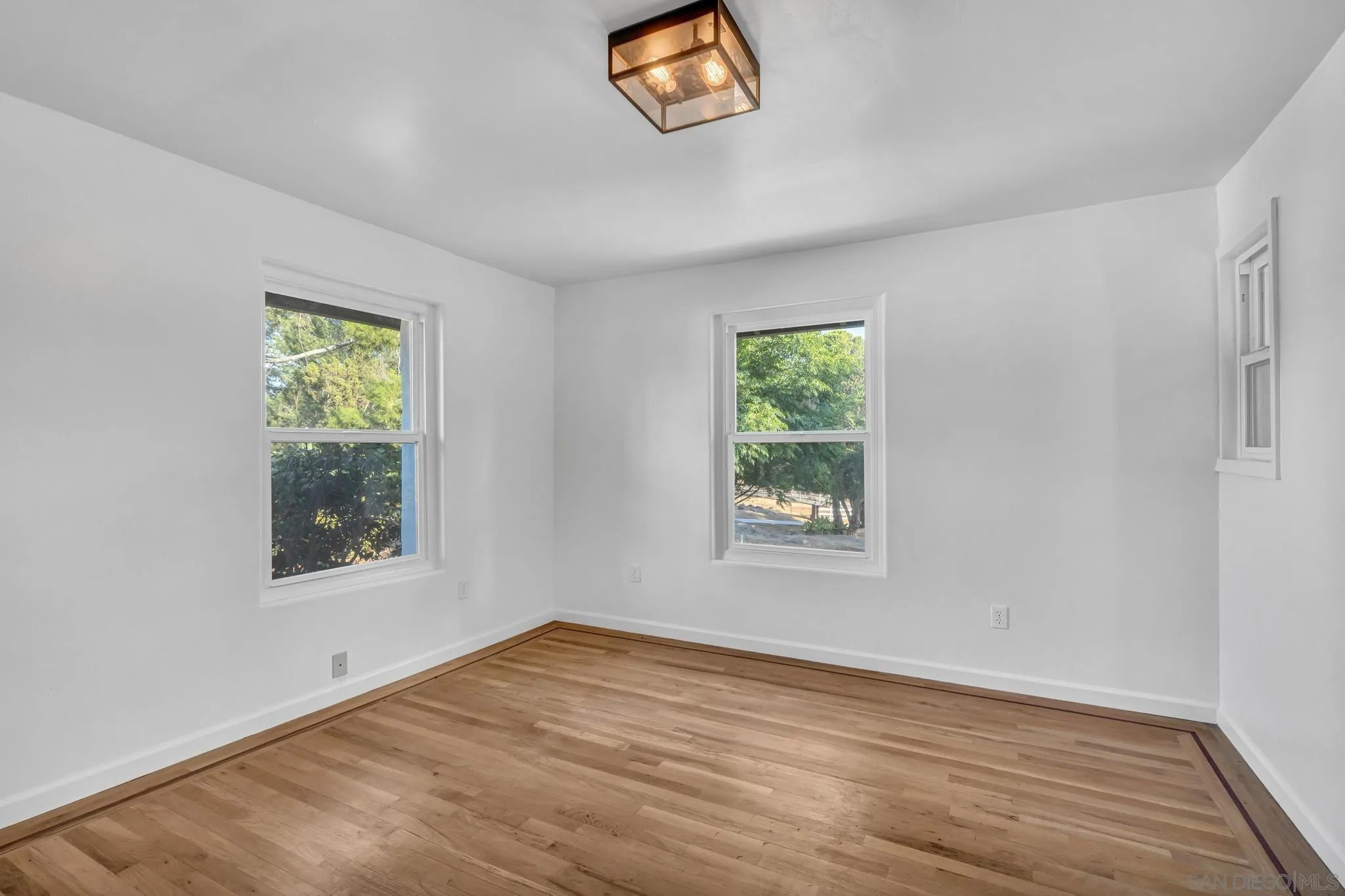 1230 Arnold Way Alpine, CA 91901 - Photo 18 of 60 a view of an empty room with a window and a window