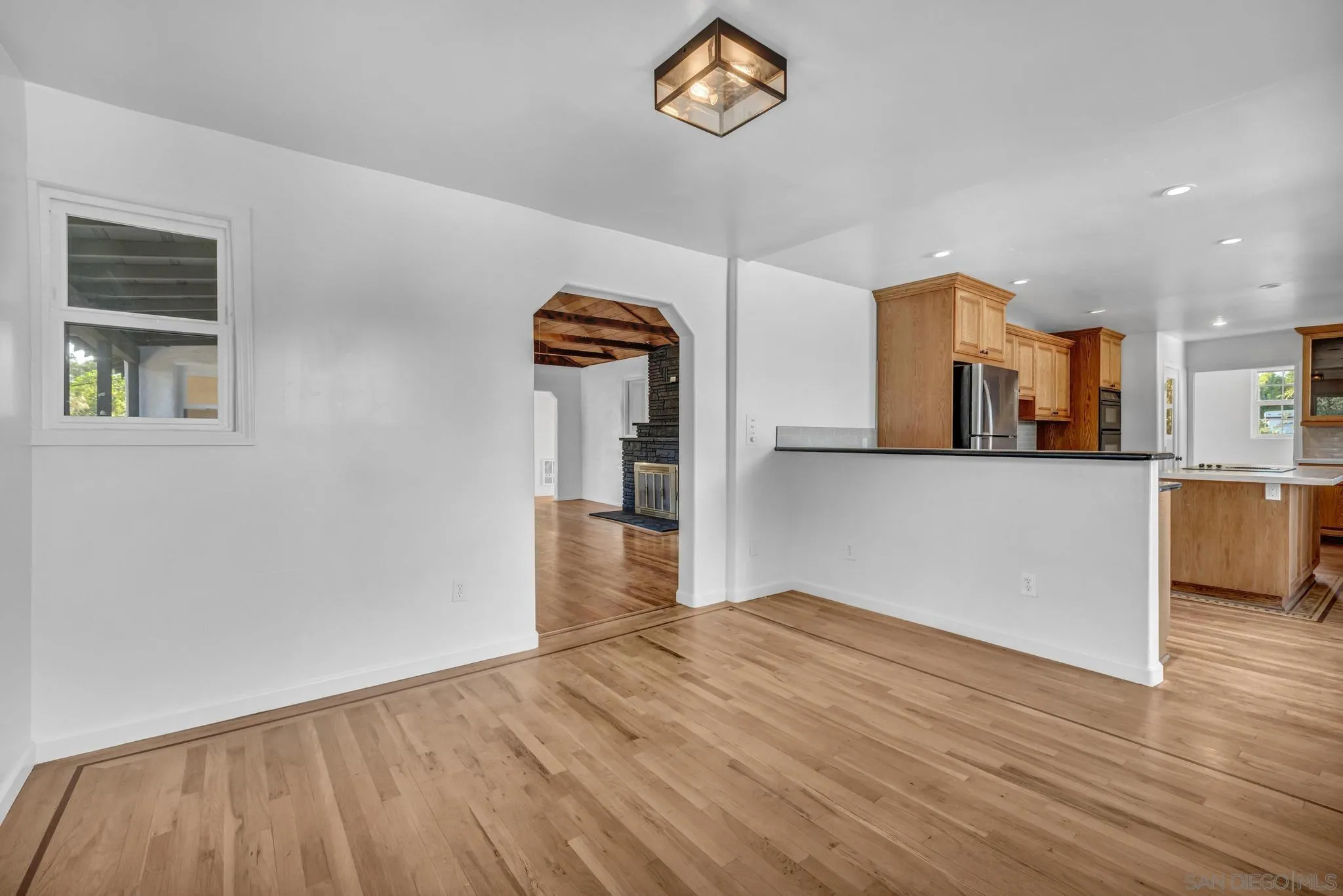 1230 Arnold Way Alpine, CA 91901 - Photo 19 of 60 a view of a kitchen cabinets and wooden floor