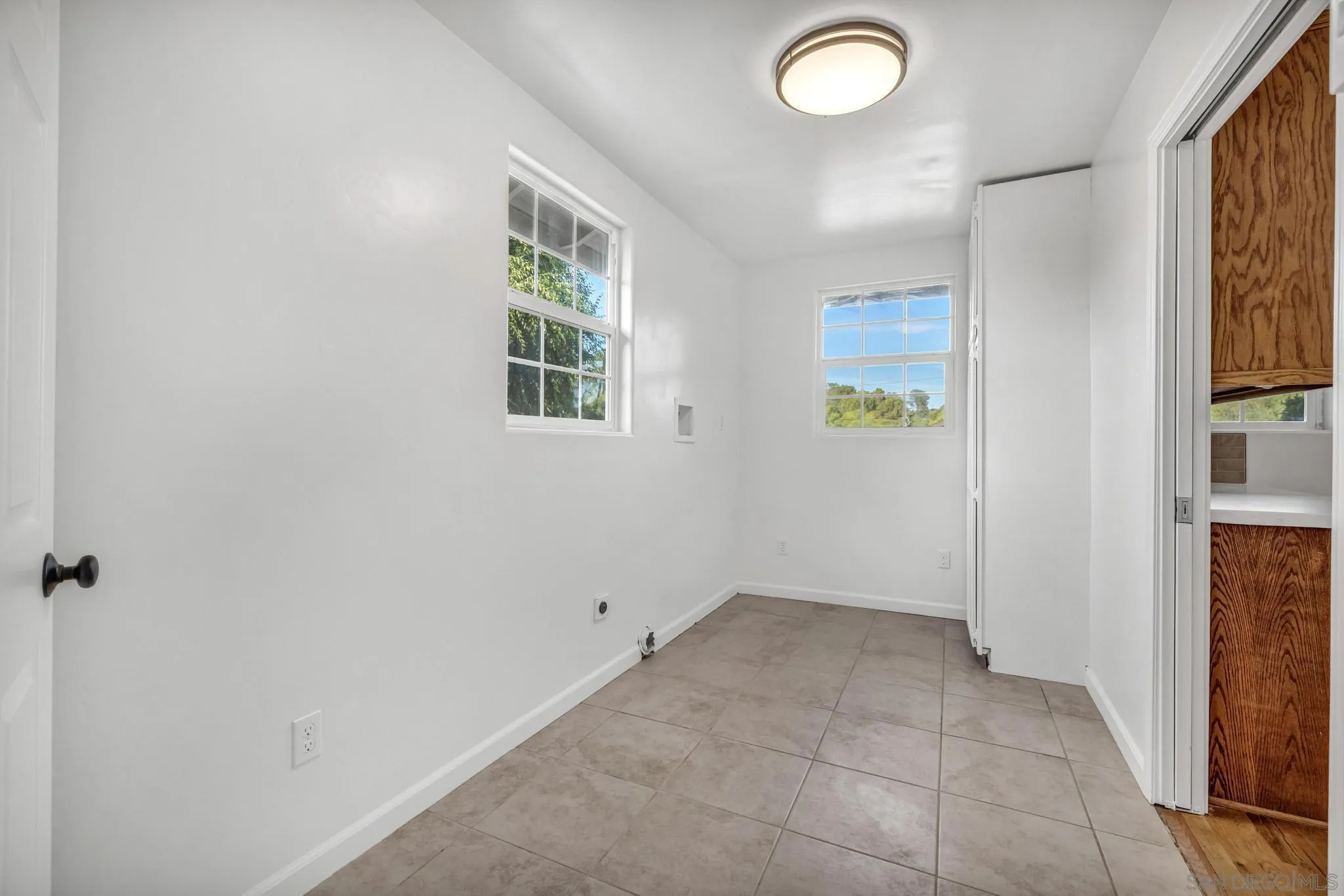 1230 Arnold Way Alpine, CA 91901 - Photo 27 of 60 an empty room with windows and closet