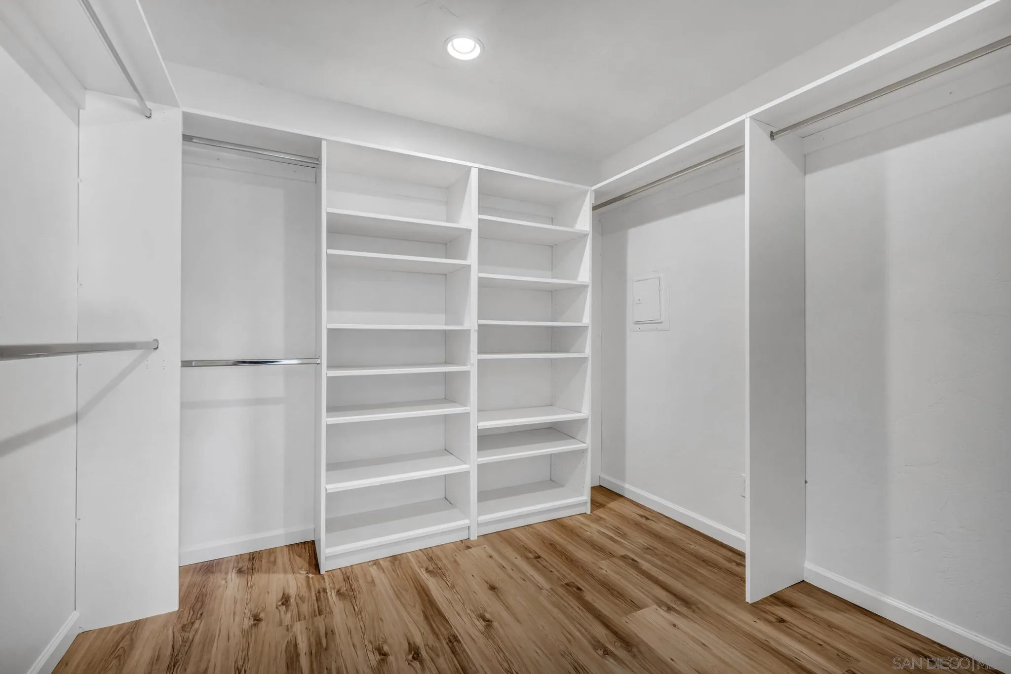1230 Arnold Way Alpine, CA 91901 - Photo 32 of 60 a view of an empty room with wooden floor and closet