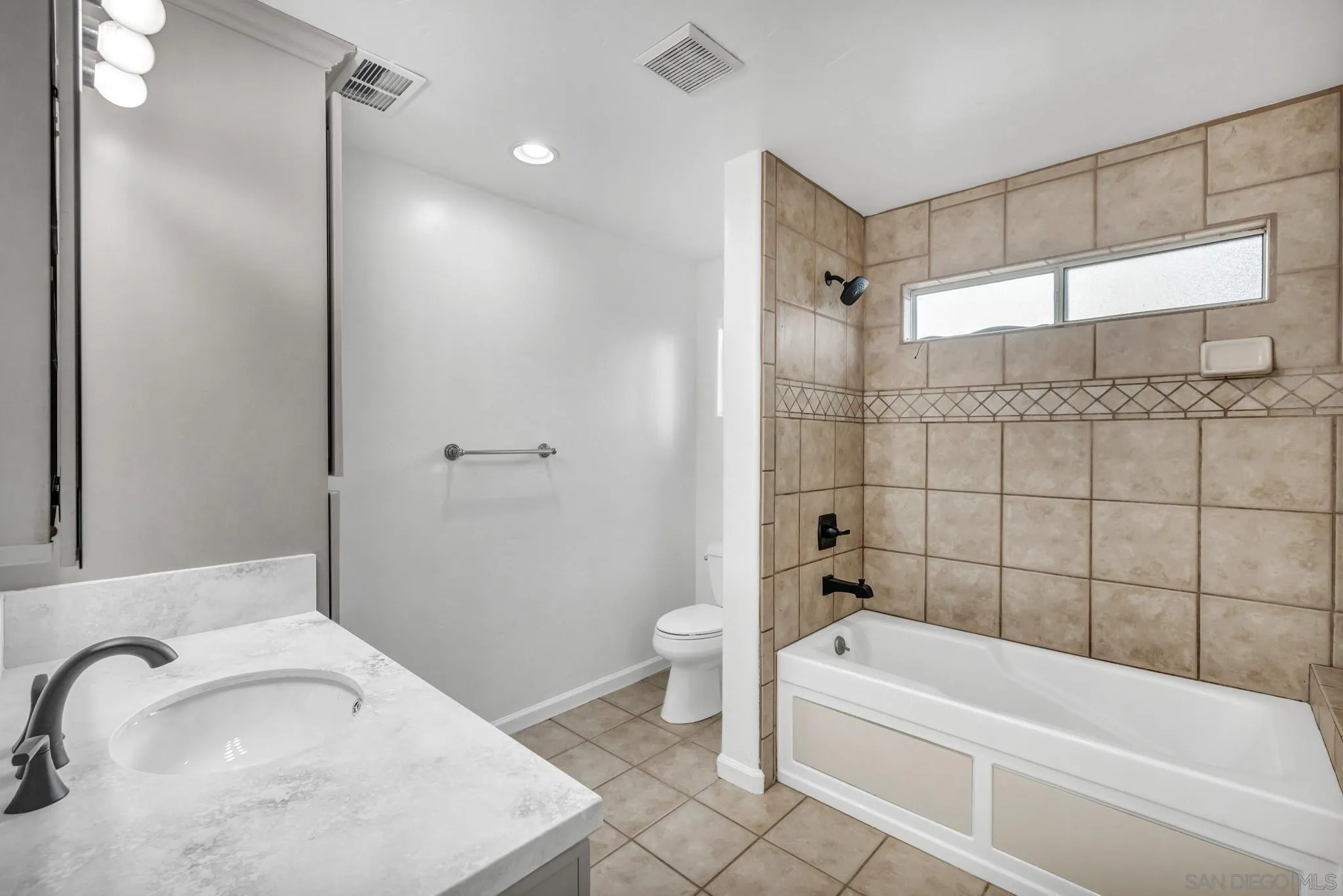 1230 Arnold Way Alpine, CA 91901 - Photo 33 of 60 a bathroom with a sink a toilet and shower