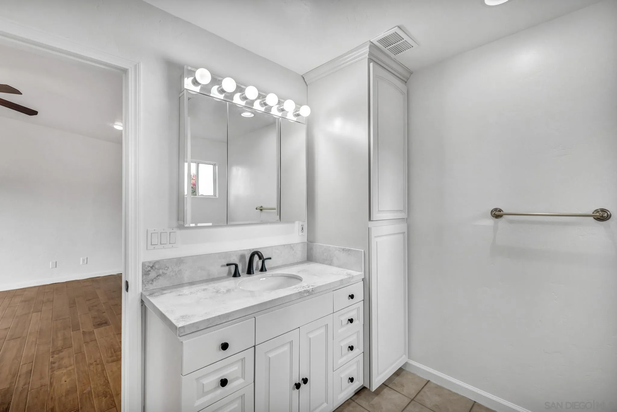 1230 Arnold Way Alpine, CA 91901 - Photo 35 of 60 a bathroom with a sink and a mirror