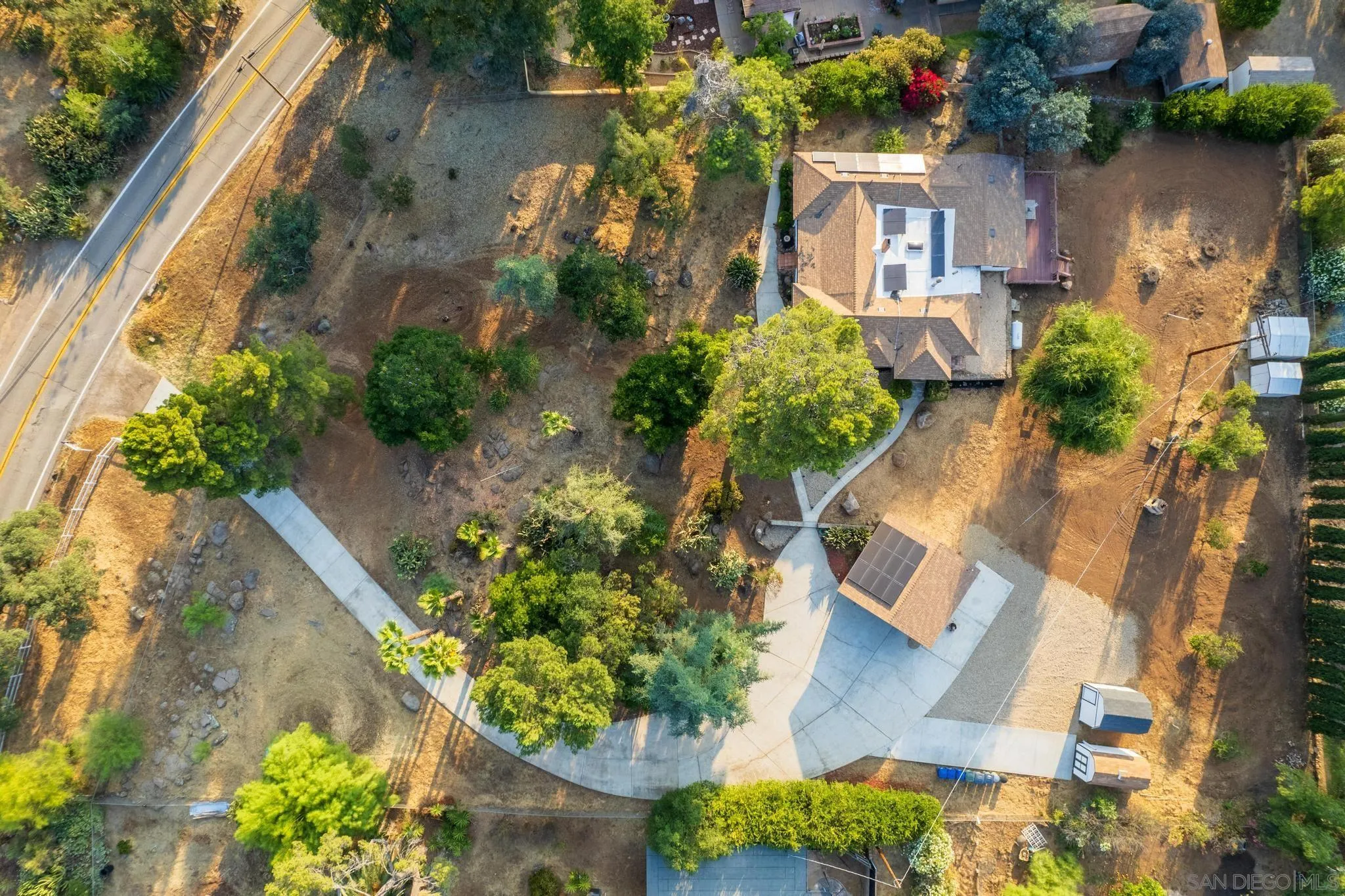 1230 Arnold Way Alpine, CA 91901 - Photo 52 of 60 an aerial view of a house with a yard and a garden