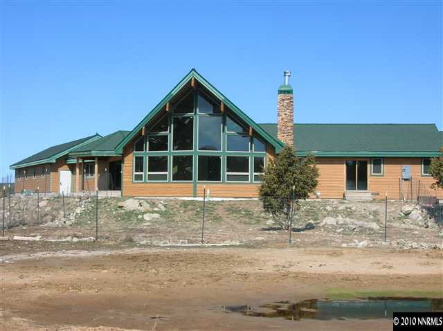 4540 Lousetown Road Reno, NV 89521 - Photo 1 of 9 a front view of a house with a yard