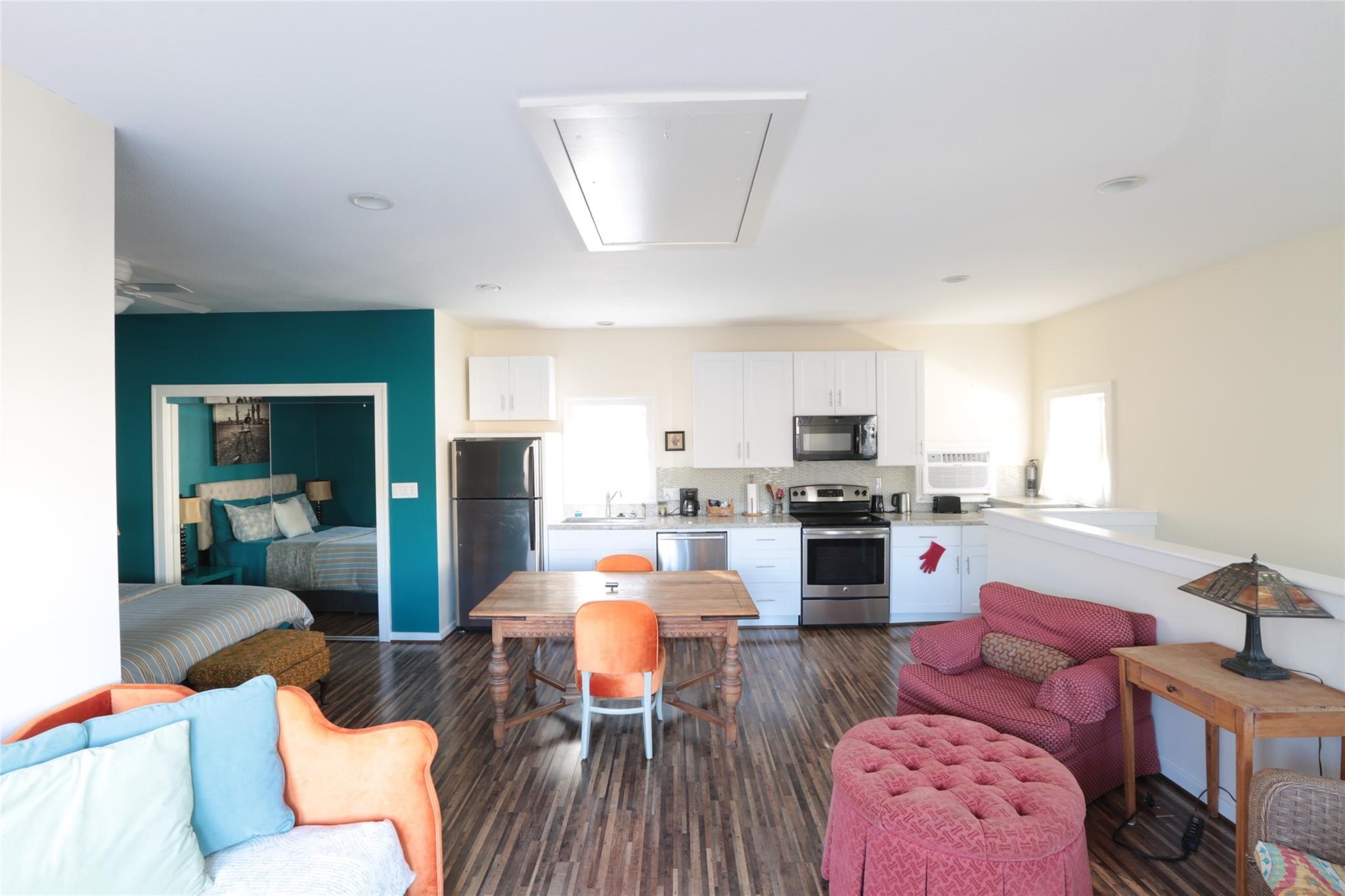 1625 Harvard Street, Unit B Houston, TX 77008 - Photo 1 of 9 a living room with furniture fireplace and flat screen tv