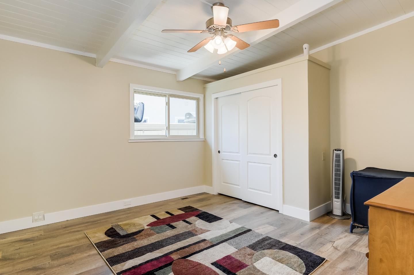 1249 Lime Drive Sunnyvale, CA 94087 - Photo 15 of 24 a room with furniture and a window