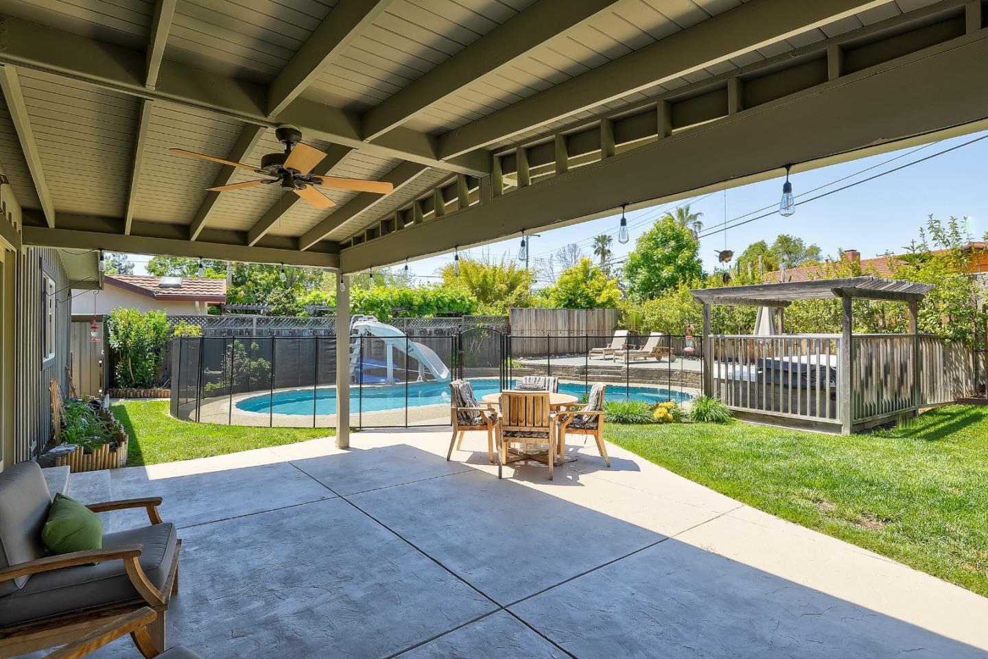 1249 Lime Drive Sunnyvale, CA 94087 - Photo 20 of 24 a view of a swimming pool with a patio