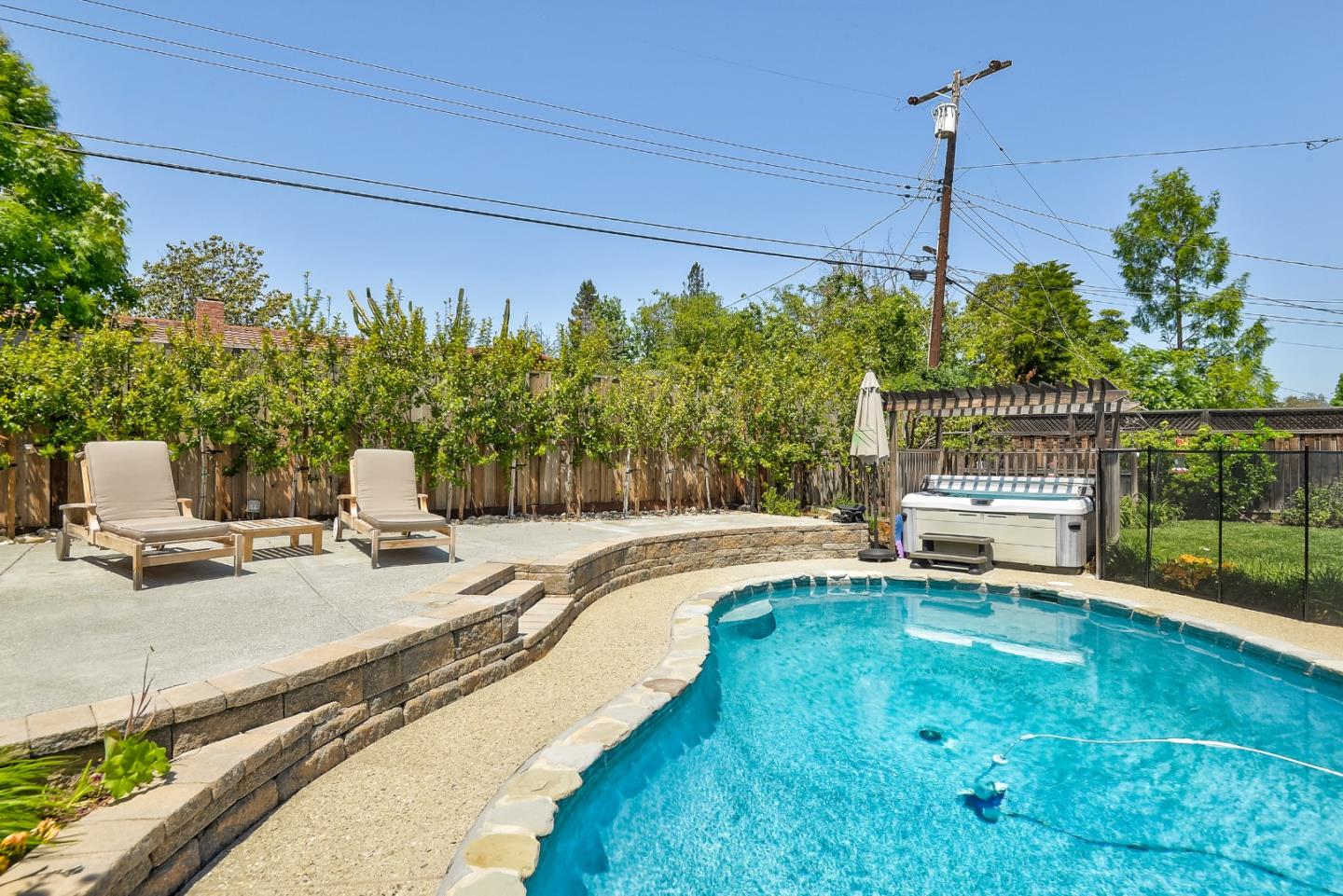 1249 Lime Drive Sunnyvale, CA 94087 - Photo 24 of 24 a view of a swimming pool with a patio