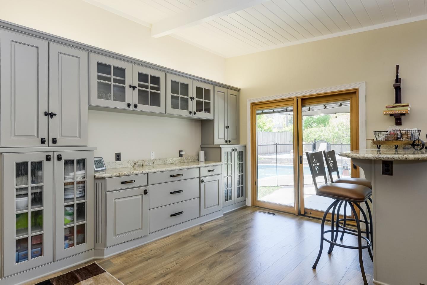 1249 Lime Drive Sunnyvale, CA 94087 - Photo 9 of 24 a kitchen with cabinets and wooden floor