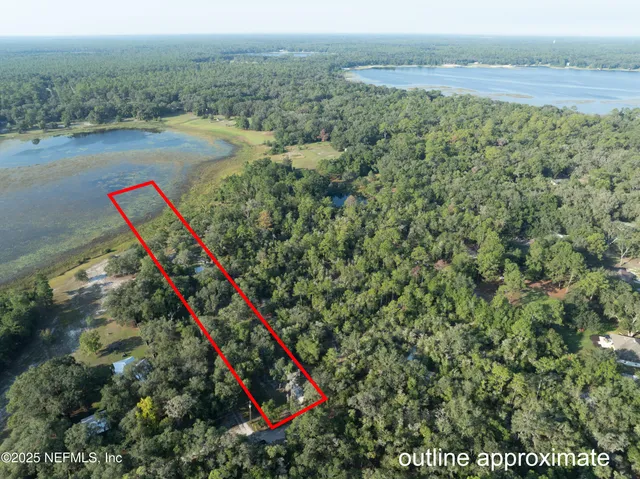 a view of a field with an outdoor space