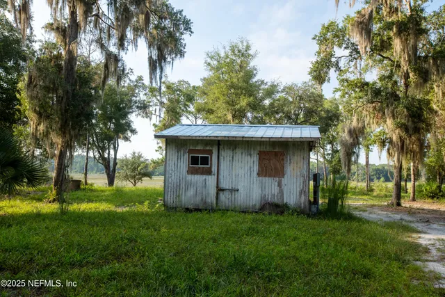 a view of backyard with green space