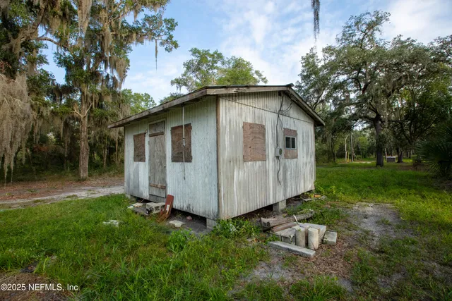 a white house that has sink in it