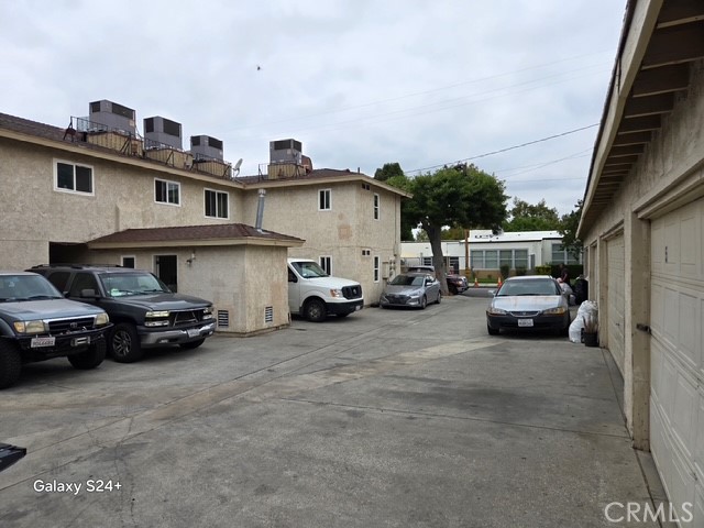 24522 Chestnut Street Newhall, CA 91321 - Photo 5 of 7 a car parked in front of a house