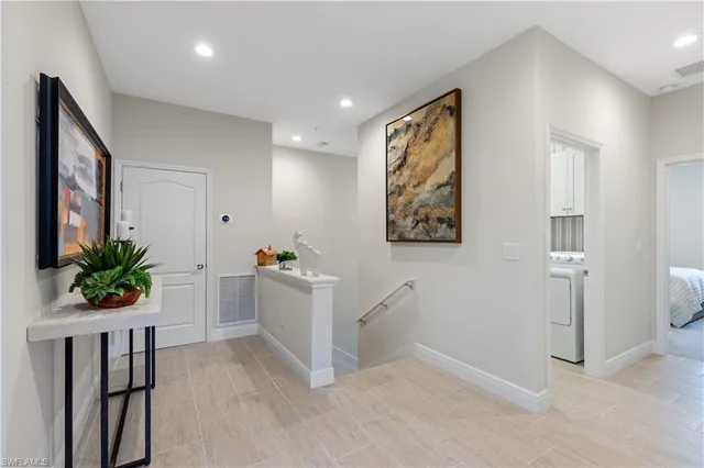 a view of entryway with kitchen