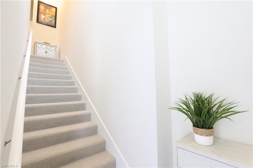 2311 Sawyers Hill Road, Unit 805 Naples, FL 34120 - Photo 26 of 27 a view of entryway with a potted plant