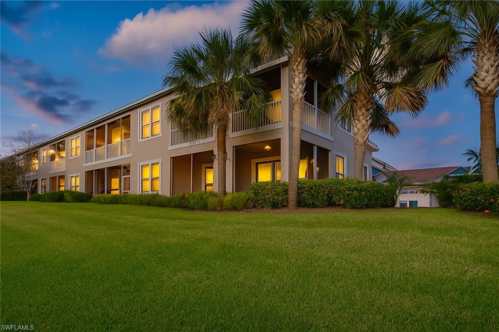 2311 Sawyers Hill Road, Unit 805 Naples, FL 34120 - Photo 27 of 27 a front view of house with yard and green space