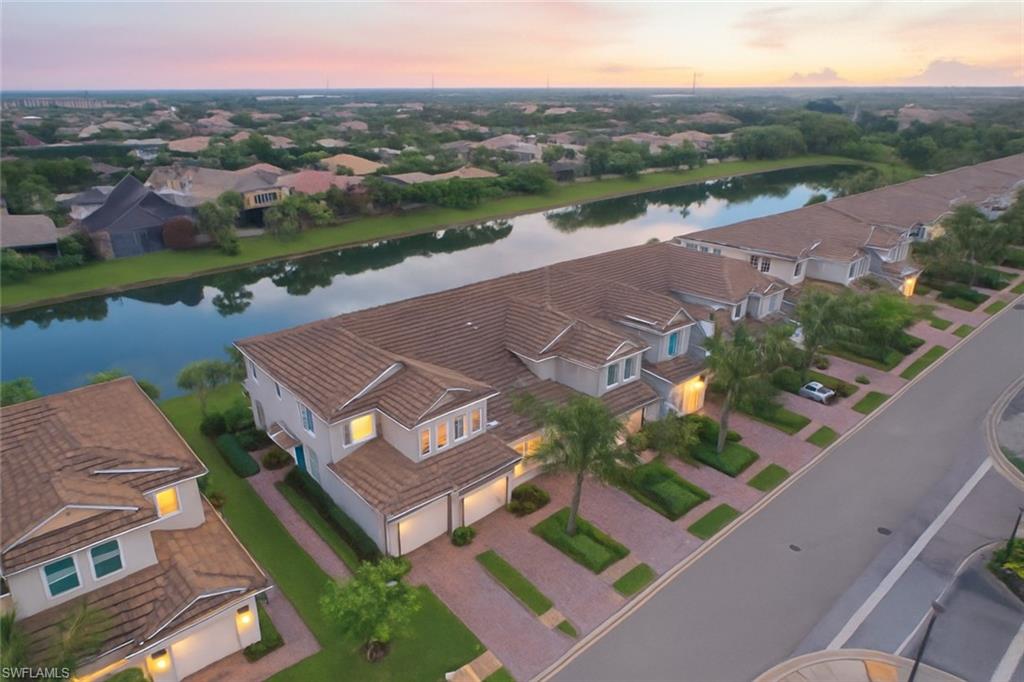 2311 Sawyers Hill Road, Unit 805 Naples, FL 34120 - Photo 5 of 27 an aerial view of a house with a garden